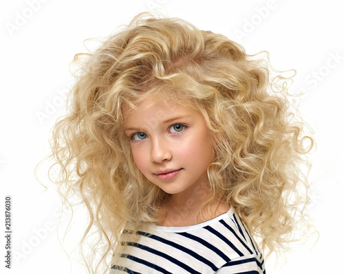 Portrait of the beautiful child on white background