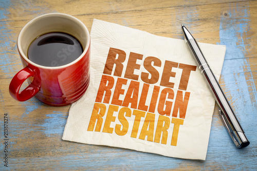 reset, realign, restart concept on napkin photo