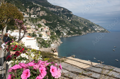 View of the town of Positano with flowers, Amalfi Coast, Italy
