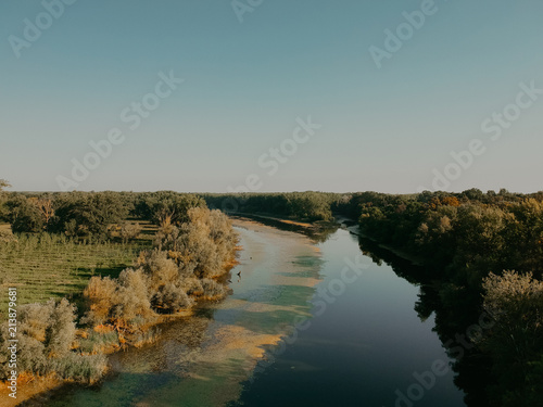beautiful morning over the river aerial shot