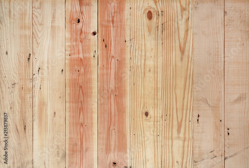 Wood plank wall with vertical stripe pattern.
