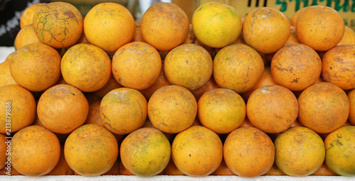 Orange fruit at market.