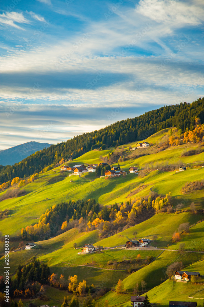 Rolling hills in the Dolomites at sunset, Val di Funes, South Tyrol. Italy
