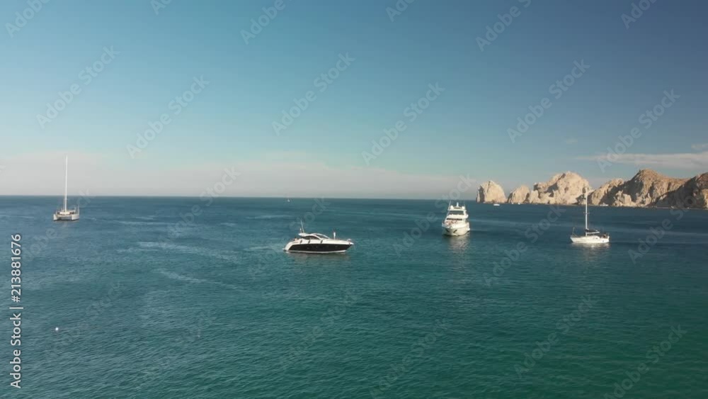 Aerial clip flying over some boats in El Medano Beach in Cabo San Lucas, México Aerial clip flying over some boats in El Medano Beach in Cabo San Lucas, México