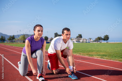 Men and women tied the ropes to prepare jogging with pleasure