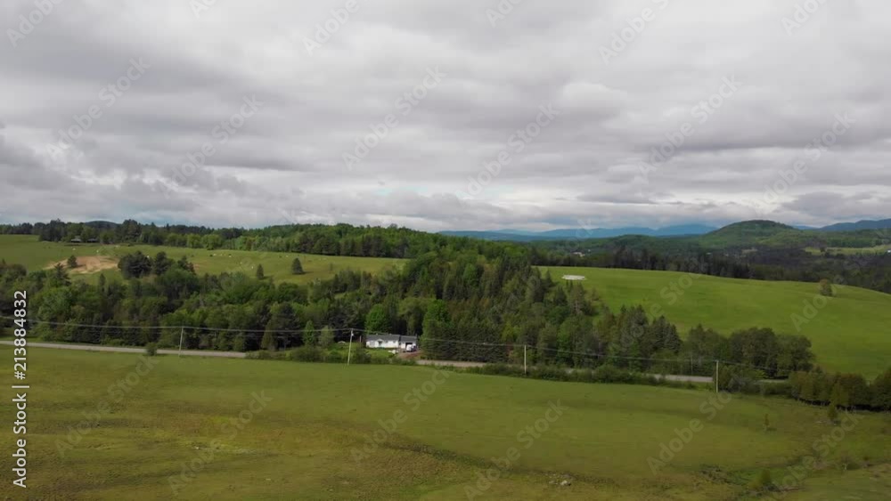 drone pan quebec farmland, mountains in spring, 4k drone pan quebec farmland, mountains in spring, 4k