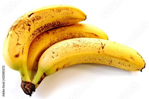 Three ripe bananas in a bunch.