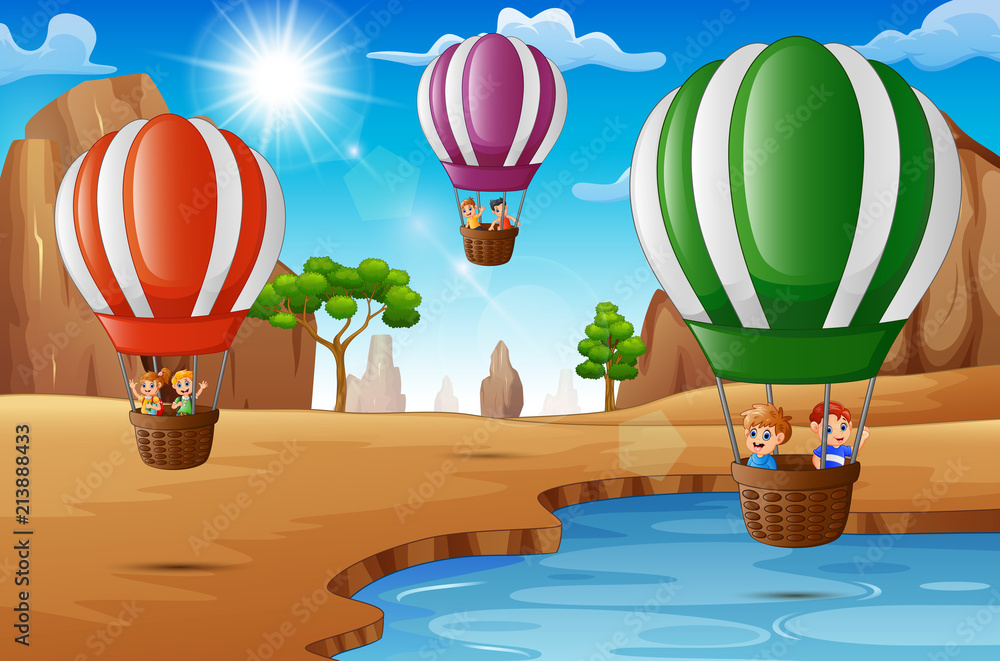 Cartoon happy kids riding hot air balloon in the desert Stock Vector ...