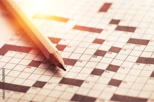 Crossword puzzle and pencil photo