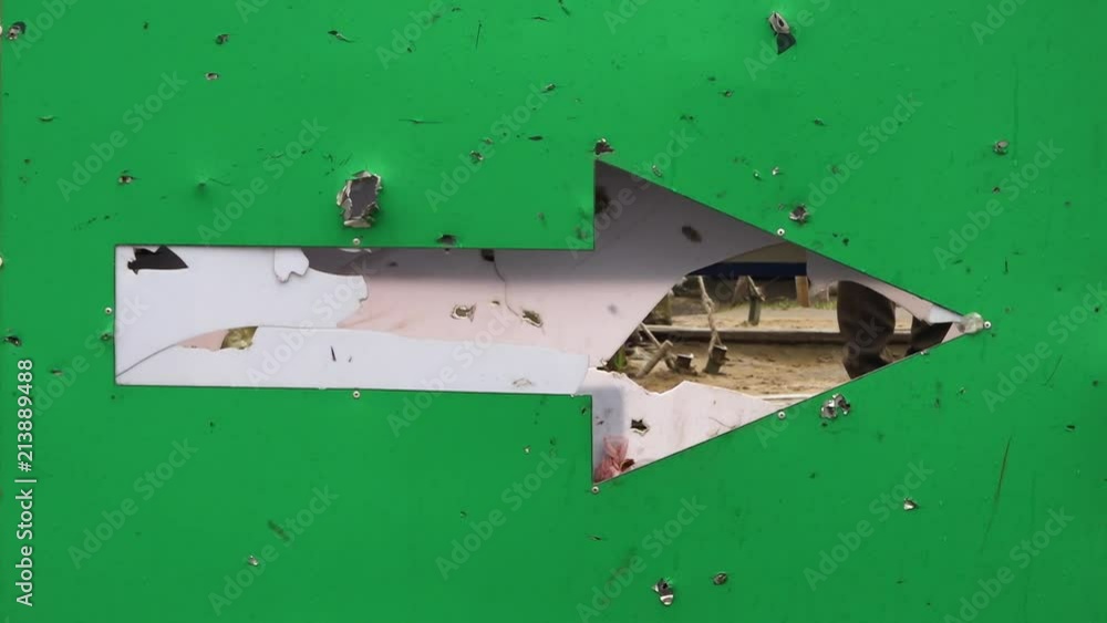 A shot of steel sheet covered with bullet strays. A shot of steel sheet covered with bullet strays.