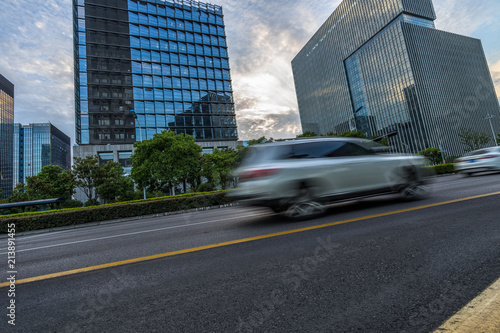 cars driving on inner city road of Suzhou, china, asia.