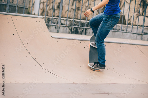 Skateboarding on skatepark ramp