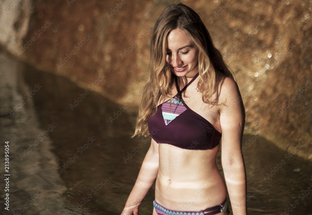 a girl in a swimsuit in the mountains a girl in a swimsuit in the mountains