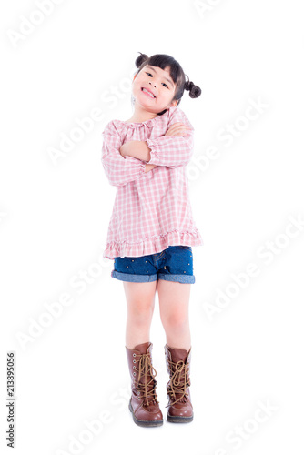 Full length of little asian girl smiling over white background