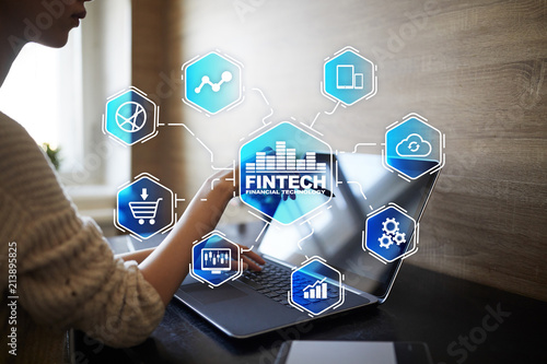 Fintech. Financial technology text on virtual screen. Business, internet and technology concept.?