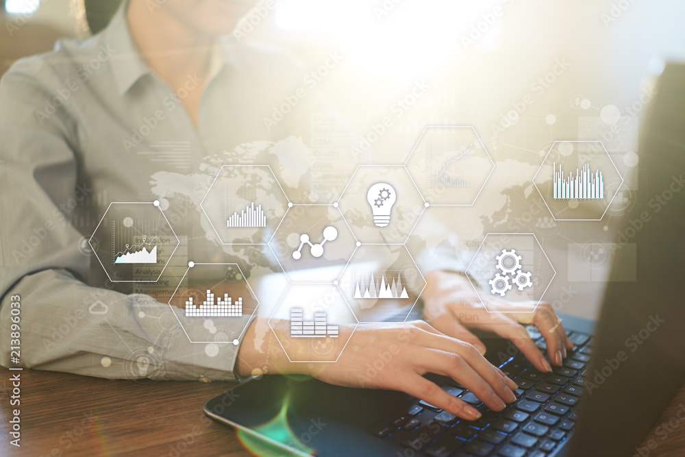 Applications icons and graphs on virtual screen. Business, internet and technology concept. Applications icons and graphs on virtual screen. Business, internet and technology concept.