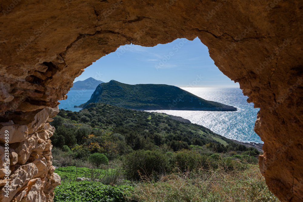 Sphacteria Island framed in arch, in Old Navarino Castle, Pylos, Peloponnese, Greece.