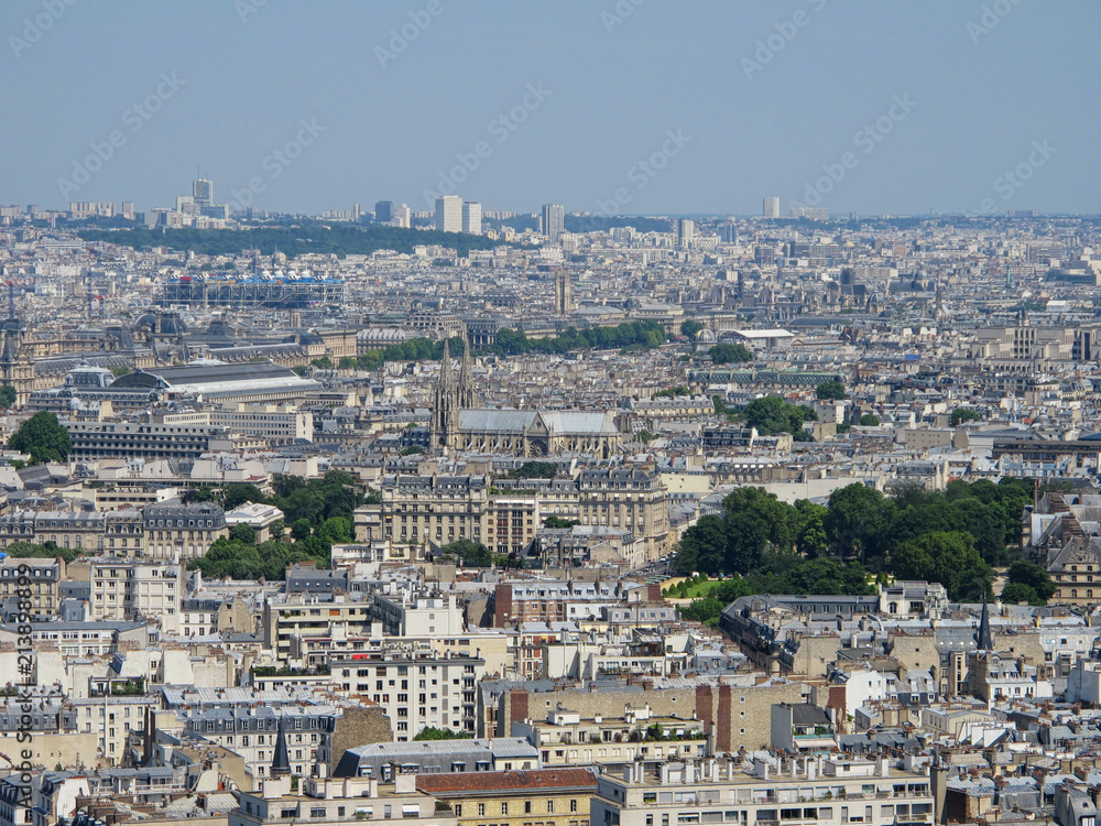 Elevated View of Paris, France Rooftops During a Summer Day