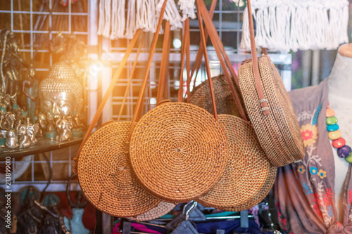 Rattan round bags at a street shop. Bali, Indonesia. photo