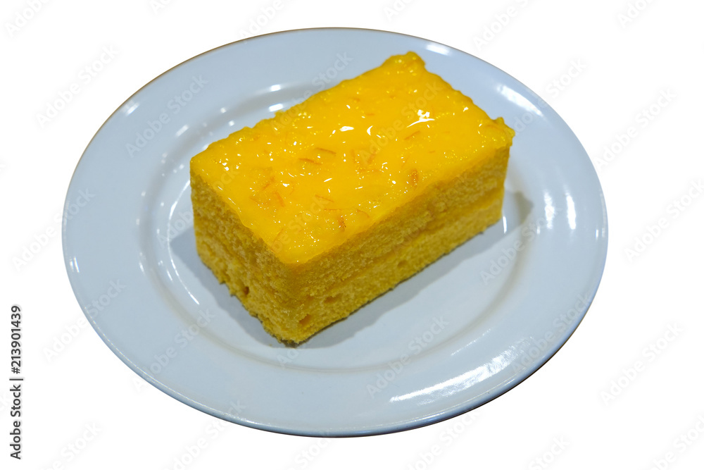 Orange sponge cake on with plate and white background with clipping path Orange sponge cake on with plate and white background with clipping path