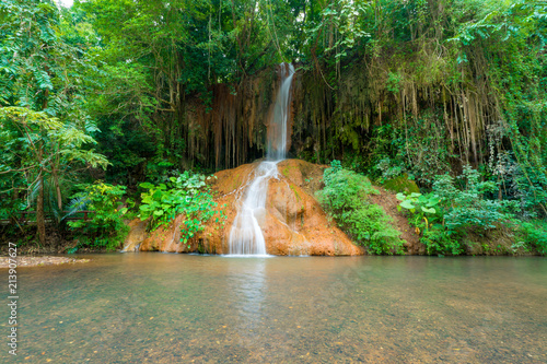 Fototapeta Naklejka Na Ścianę i Meble -  beautiful waterfall in rainforest at Phu sang Falls Phoyao, Thailand