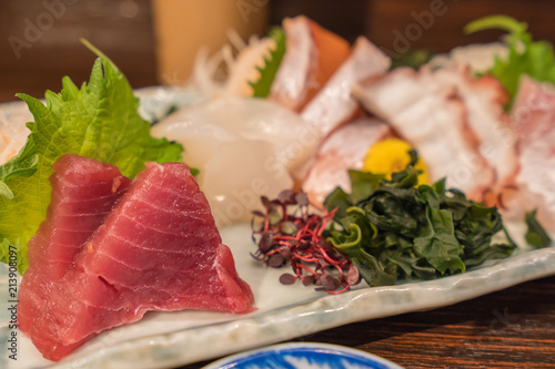 Salmon raw sashimi sushi with shrimp on plate, japanese food