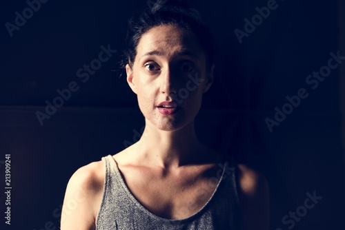 Woman with face expression black background