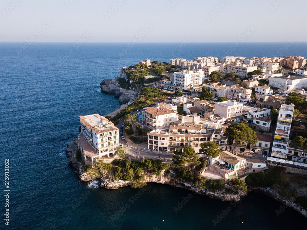 Aerial: Houses on the shore in Cala Figuera, Mallorca, Spain
