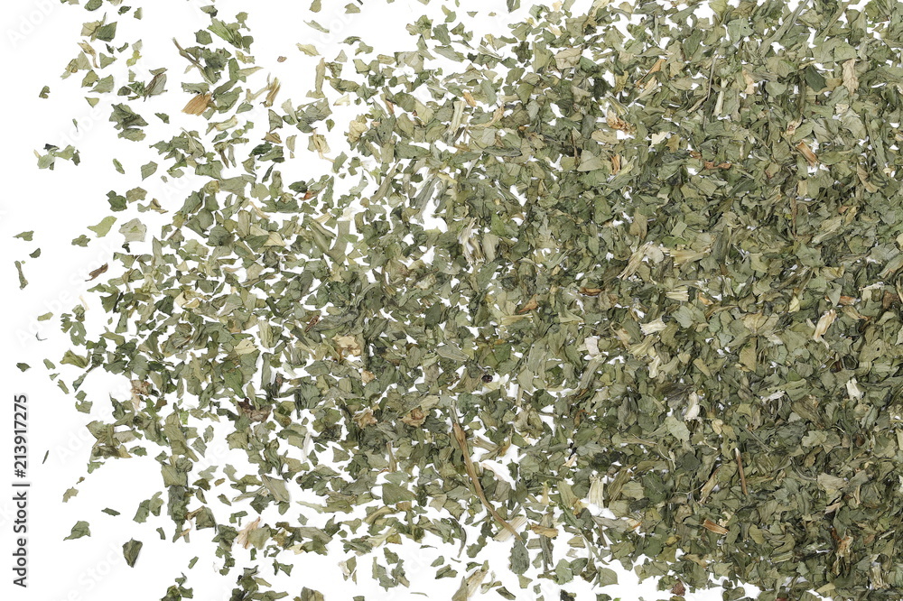 Sliced and cut dry celery leaves pile, isolated on white background, top view Sliced and cut dry celery leaves pile, isolated on white background, top view