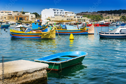 Traditional boats at Marsaxlokk Harbor in Malta © ilolab