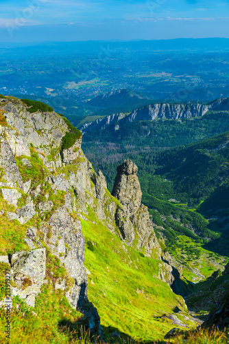 Fototapeta Naklejka Na Ścianę i Meble -  vertical photograph of a rocky mountain over the valley of Zakopane, Poland