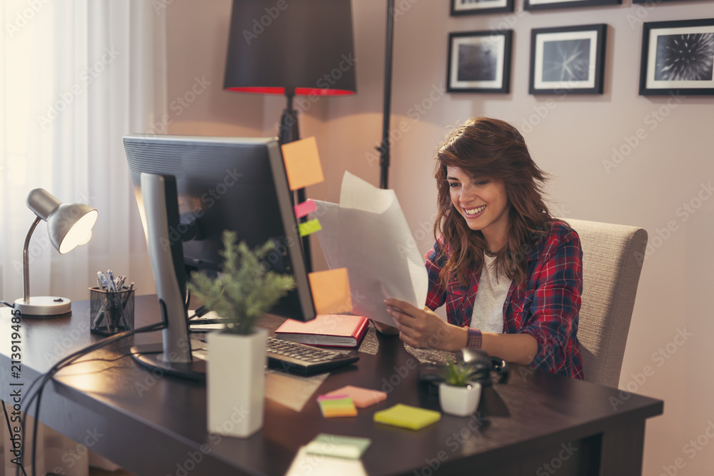 Woman reading contracts Woman reading contracts
