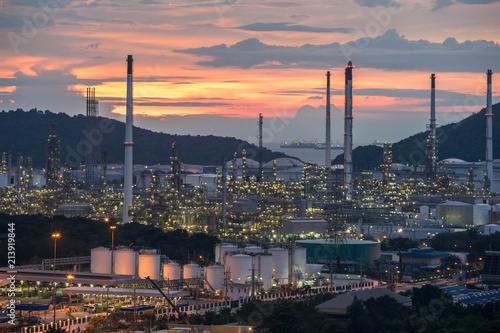 Beautiful sunset petrochemical oil refinery factory plant cityscape of Chonburi province at night , landscape Thailand