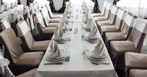 Elegant set table, Wedding preparation. Seth dishes and chairs, wedding decoration