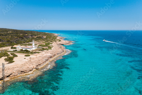 Aerial  Cape Ses Salines lighthouse in Mallorca