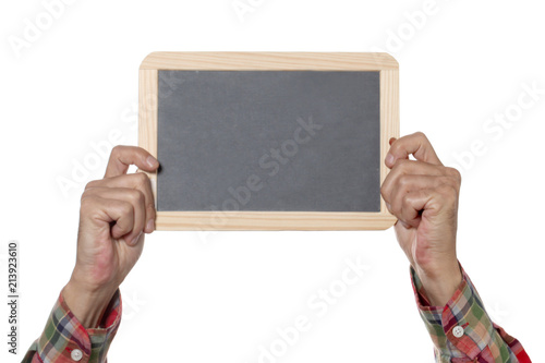 Photos man's hands hold a slate blackboard isolated on whithe background with copy spac
