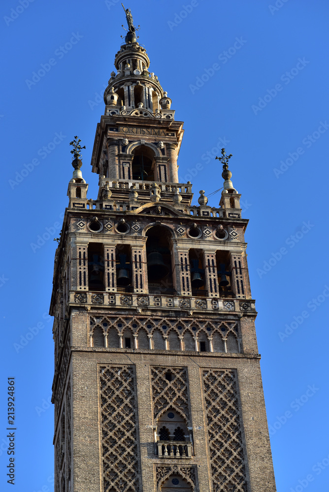 Top of the Giralda tower (former mosque minaret converted into Cathedral bell tower) in Seville, Spain