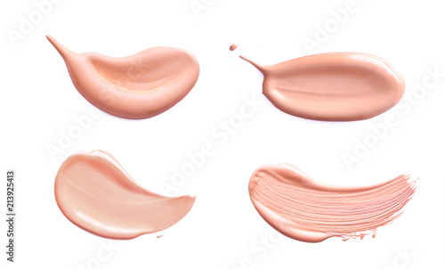 Makeup foundation cosmetic smear cream set isolated on white background. Light beige liquid foundation sample smears