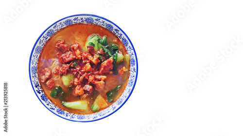 Top View of Chinese Muslim Noodle with Meat and Vegetables in A White Bowl.  Selective Focus and Isolated on White Background with Clipping Path or Selection Path and Copy Space for Text.