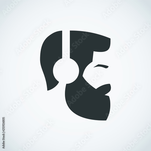 Bearded man wearing headphones.