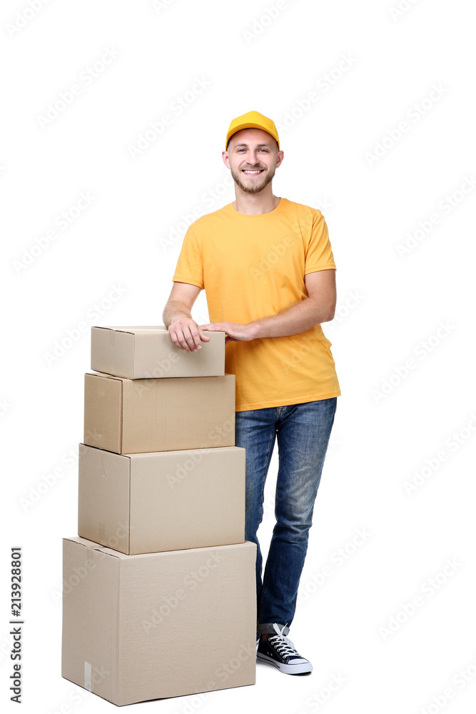 Delivery man with cardboard boxes on white background Delivery man with cardboard boxes on white background