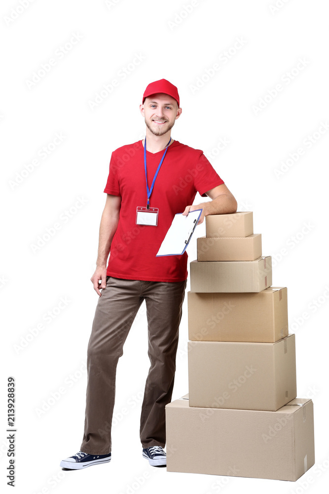 Delivery man with cardboard boxes and clipboard on white background Delivery man with cardboard boxes and clipboard on white background