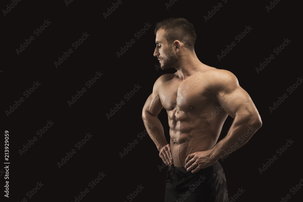 Fototapeta premium Strong athletic man showes naked muscular body