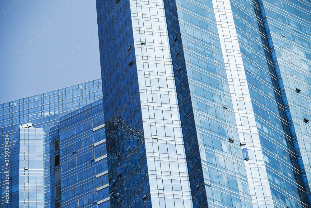 Fototapeta premium Office towers made of blue glass and steel
