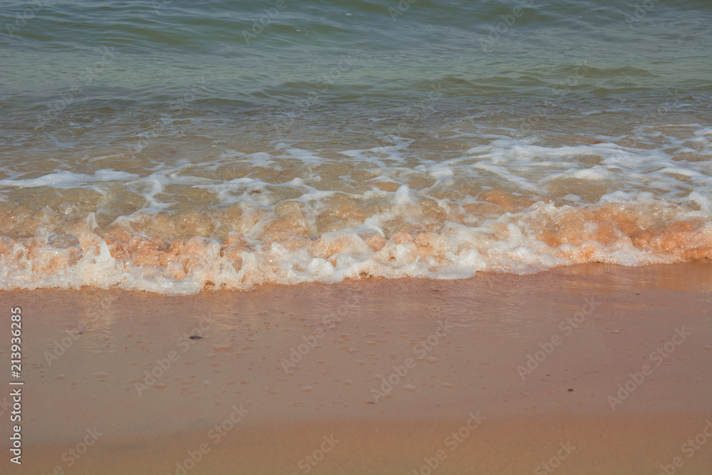Sea soft  wave on the white sand  beach close up