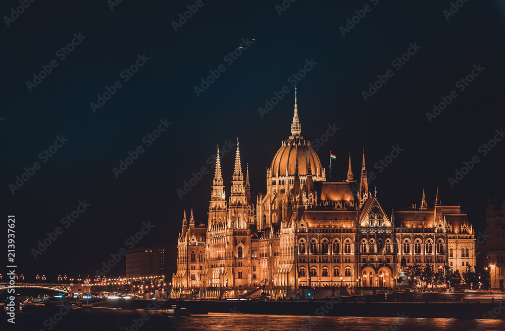 Night view of the illuminated building of the hungarian parliament in Budapest.