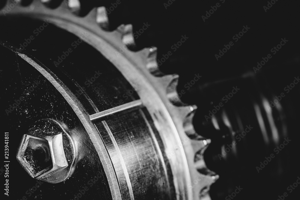 Monochrome background image of gear close up. Artwork from auto part in macro photography. Monochrome background image of gear close up. Artwork from auto part in macro photography.