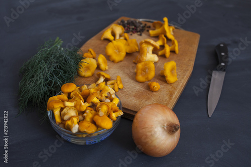 Fresh chanterelle mushrooms on a cutting Board