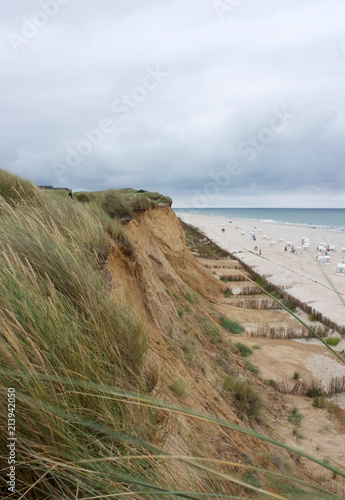Scenic landscape of the red cliff on the island Sylt  Germany.