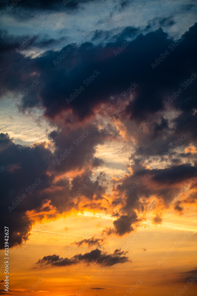Fototapeta premium Clouds in the sky at sunset as background